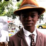 menino_com_retrato_de_cartola